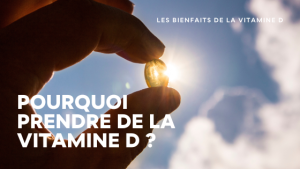 Une main tenant une vitamine D devant les rayons du soleil